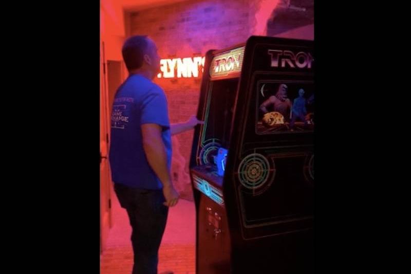 secret game room behind pinball machine